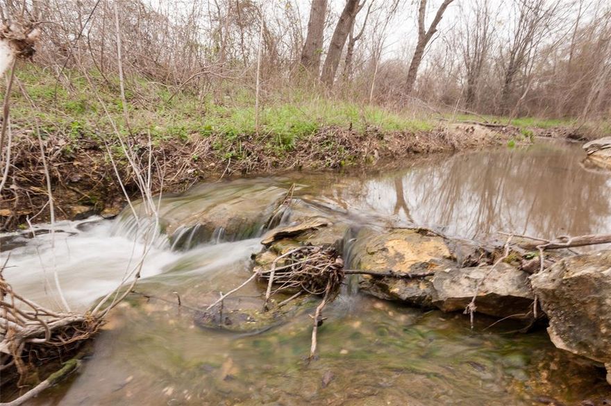 Beautiful 2.18 acre lot on Dunaway Rd., just south of Greathouse Rd.  The homesite has a gentle roll and has a creek and trees at the back of the property.  The lot is part of The Ranch at Stone Hill, which means it has deed restrictions, but it is excluded from paying any HOA dues.  2,500 S.F. minimum home size.  Waxahachie ISD.  NO CITY TAXES.