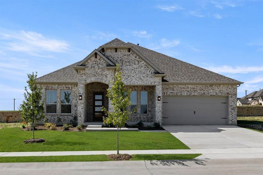 MLS# 21026743 - Built by Sandlin Homes - Ready Now! ~ The Bellaire plan is a beautifully crafted home offering four generously sized bedrooms, three full bathrooms, and a dedicated study – perfect for a home office, library, or quiet retreat. The heart of the home is a spacious great room, enhanced with a stunning beamed ceiling that adds warmth and architectural interest to the interior.    The open concept layout seamlessly connects the living, dining, and kitchen areas, making it ideal for entertaining and everyday functionality. The chef-inspired features a built-in oven tower, a large island with three pendants over, and a stone backsplash that pairs perfectly with the color concept in the home. A neutral color palette expands throughout the home, complemented by the cohesive vinyl flooring and tasteful tile selections that offer both durability and style.   High end details include 8-foot interior doors that elevate the overall design, along with bronze and satin brass fixtures that bring depth to the design of the home. The home includes an additional coach light for added exterior charm and security.