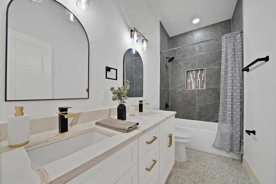 Major Price Adjustment! Seller is motivated. Come see this charming and beautifully reimagined home in the heart of Fort Worth. This 4bedroom, 2bath home has been completely remodeled down to the studs, giving it the feel of a brand-new build while preserving timeless charm. Inside, you’ll find a spacious layout with modern yet traditional elements blended throughout.The modern open-concept floor plan, complemented by a generous living and dining space, with ample secondary bedrooms, and a full-sized utility room. The large kitchen offers plenty of counter space, for everyday living, cooking and entertaining and ready for  those holiday dishes. With its elevated bathrooms bringing a spa-like experience, featuring arched mirrors, glass shower doors, and thoughtful modern touches. Throughout, you’ll find a blend of modern and traditional design elements, creating a warm yet stylish atmosphere. Significant updates were made to ensure a peace of mind and long-term value, including a brand-new roof, new driveway, and so many more improvements.Ask for a full list to appreciate the extensive work completed. Every corner reflects careful attention to detail, from the layout to the finishes, making this home move-in ready and designed for today’s lifestyle.The homeowner spared no expense on fresh updates and an inviting design. 

With a short drive to popular coffee shops, Magnolia Avenue, Fairmount, the Hospital District, the Trinity River, Downtown Fort Worth, TCU, Hulen Street, University Drive, the Fort Worth Zoo, and more, this home offers both convenience and charm in one of the city’s most vibrant areas. 

With its fresh design, prime location, and move-in ready appeal, this home is a true gem. Schedule your showing today!*Electric Range will be installed during Option.