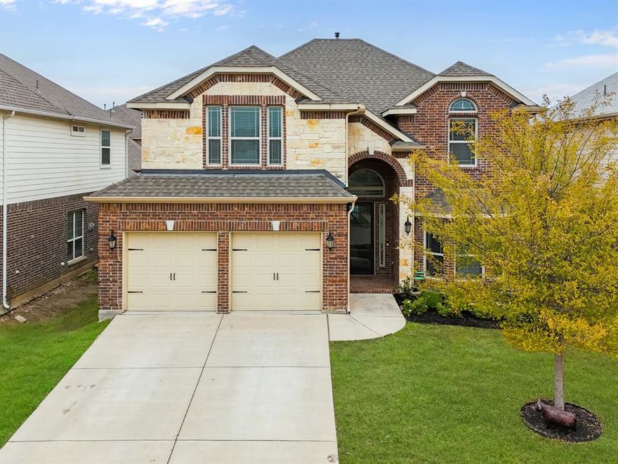 This beautifully designed two-story home, offers the perfect blend of modern construction, thoughtful updates, and functional living spaces ideal for today’s lifestyle. Newer-age construction means improved energy efficiency, contemporary floor plans, updated systems, and the peace of mind that comes with more current building standards. The spacious primary suite is located on the first floor and features generous proportions, dual sinks, an ensuite bath, and a walk-in closet—creating a true private retreat. Also on the main level is a dedicated office, perfect for working from home, along with an open and inviting living area showcasing built-in cabinetry, a gas fireplace, and abundant natural light. The kitchen is the heart of the home, complete with granite countertops, a large island, eat-in dining space, pantry, built-in cabinetry, gas cooktop, and water line to the refrigerator—ideal for both everyday living and entertaining. Adjacent dining and breakfast areas provide flexibility for gatherings large or small. Upstairs, you’ll find three spacious secondary bedrooms, including one with an ensuite bath, along with an oversized game room and a dedicated media room featuring built-in cabinetry perfect for movie nights or game days. Multiple full baths ensure comfort and convenience for family and guests alike. Additional highlights include engineered wood, ceramic tile, and carpet flooring, vaulted ceilings, sound system wiring, a wet bar, tankless water heater, and a full security system. The brick exterior, composition roof, and covered patio add timeless appeal, while the landscaped interior lot with sprinkler system offers easy outdoor enjoyment. Located in a vibrant community with access to a clubhouse, pool, parks, and jogging and bike paths, this home combines comfort, style, and modern convenience—all within a well-maintained neighborhood setting.