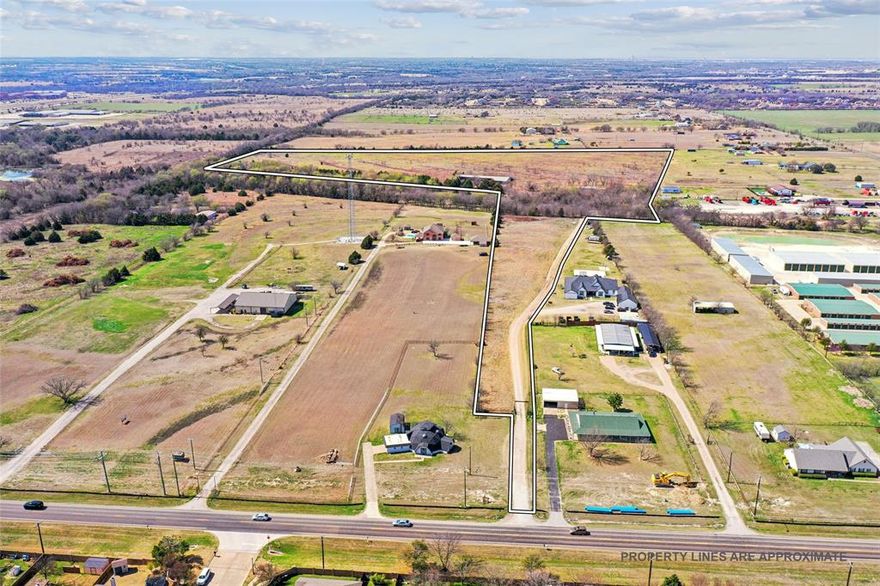 Rare opportunity with 38.5 acres ideally situated between Waxahachie and Midlothian. This versatile property offers the perfect blend of privacy and accessibility, located just minutes from established neighborhoods and growing commercial developments. As you wind back to the larger part of the property you will pass under a canopy of trees to find and impressive 8,000+ square foot pole barn built in 1996. It was thoughtfully designed for equestrian use, featuring 19 horse stalls, 11 paddock runs (eight fully enclosed), a designated stud stall, and a vet stanchion box. Each stall on the south side of the barn has its own tack room. The layout supports both professional operations and private ranch living. The barn can easily be adapted for a workshop, storage space or other uses if equestrian facilities aren't needed.  The possibilities for this property are wide open. Create a stunning private ranch estate, develop a custom neighborhood with large acreage lots, or restore the grounds into a premier equestrian facility. The combination of location, acreage, and existing infrastructure makes this a rare and flexible investment opportunity in one of the area’s fastest-growing corridors.