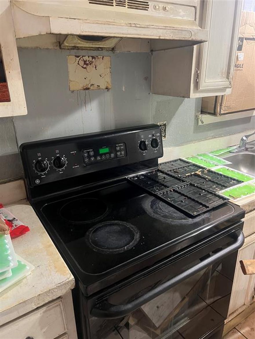 COME AND SEE THIS CONDO WITH REFRIGERATOR STOVE WASHER AND DRYER THEY WILL STAY