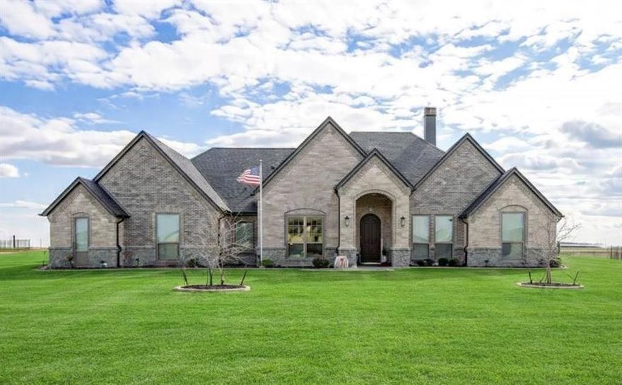 An exceptionally rare offering in a prestigious gated enclave within the highly acclaimed Godley ISD, this refined 4-bedroom, 3-bath, 3 car garage executive estate rests on a sprawling one-acre homesite, offering privacy, scale, and elevated living. Thoughtfully designed for both elegance and versatility, the expansive bonus suite—complete with a full bath and generous closet—presents endless possibilities as a fifth bedroom, private guest retreat, media lounge, executive office, or sophisticated game room. A chef’s kitchen anchors the home, complemented by formal dining spaces and abundant storage—ideal for seamless entertaining with family and friends. Walls of windows flood the interiors with natural light, highlighting rich hardwood floors and framing breathtaking panoramic views and golden-hour sunsets. The outdoor living experience is equally compelling, featuring an oversized covered patio and cross-fenced grounds—an exceptional canvas for a resort-style pool, outdoor kitchen, or tranquil entertaining retreat. Impeccably maintained, secluded, and serene, this luxury residence offers timeless design, modern comfort, and an unparalleled lifestyle within one of the area’s most coveted communities. Located outside city limits with no city taxes, and just minutes from the toll road, enjoy effortless commuting with close proximity to premier shopping, dining, and entertainment.