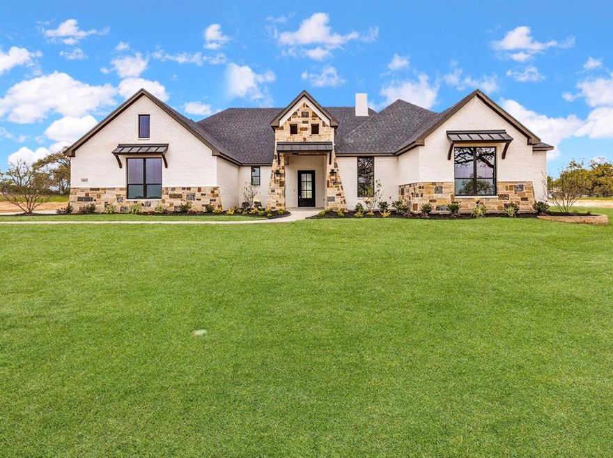 Newly Constructed Masterpiece in Estancia Weatherford's Newest Exclusive Neighborhood,  Exceptional Curb Appeal is a Perfectly Blended Style of Hill Country Meets Farm House, Situated on Just Over an Acre Grounds, Walk In to Find High End Finishouts, Expansive Living Areas with a Wall of Windows, Exposed Beams & Handsome Floor to Ceiling Stone Fireplace,  Enjoy the Chef's Kitchen Featuring Quartz Countertops, Custom Cabinetry, Oversized Built in Refrigerator & Stainless Appliances, Gas Cooktop, Double Ovens & Massive Island Perfect for Hosting, Walk in Pantry & Coffee Bar,  Gorgeous Lighting & Hardware,  Master Suite is Cozy & Inviting Complete with a Luxury Spa Bath, Spacious Secondary Bedrooms, Ensuite Bath, Gameroom Perfect for Entertaining Guests or Step Outside & Enjoy a Nice Fire on the Back Porch, You will the Love the Peace, Quiet & Parker County Sunrises & Sunsets all While Being Minutes to I-20, Restaurants & Shopping!  Best of Both Worlds!