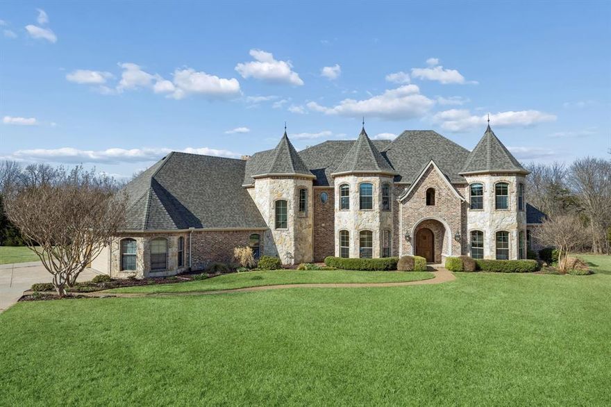 Rare opportunity to own a private estate on 2.4 tree-covered acres in Lovejoy ISD! Tucked away on a quiet cul-de-sac at the back of the neighborhood, this custom home offers exceptional privacy, scenic surroundings, and the freedom of no HOA, allowing flexibility of design while preserving the character of the community. The property showcases beautiful mature trees and backs directly to White Rock Creek where you can fish, explore, or simply enjoy the natural setting, creating a backyard environment that feels more like a private retreat than a typical neighborhood lot. The floorplan is exquisite with a temperature controlled wine room, 5 bedrooms, primary and guest bedroom on first floor, gourmet kitchen, dedicated office, massive game room with cinema, and two fantastic outdoor living spaces. A large covered patio with fireplace creates the perfect gathering place for year-round entertaining, while the recently resurfaced Pebble Tec pool offers a refreshing centerpiece for warm Texas days. A huge covered balcony on the second floor overlooks the backyard and pool, providing a spectacular elevated space to relax, entertain, or take in tranquil Texas sunsets. Inside, the home offers spacious living areas and thoughtful design throughout, highlighted by an incredible tiered media room that truly feels like your own private cinema—perfect for movie nights, sporting events, or entertaining guests. Properties offering this level of privacy, acreage, and outdoor lifestyle are increasingly rare, especially when paired with highly acclaimed Lovejoy ISD and convenient access to nearby shopping, dining, and major commuting routes. With its combination of natural beauty, resort-style outdoor living, and a premier location in one of Collin County’s most sought-after areas, 41 Pecan Grove Circle delivers the lifestyle you've been searching for. Come experience the privacy, space, and charm of this exceptional Lucas property. Hop in the car and come visit today!