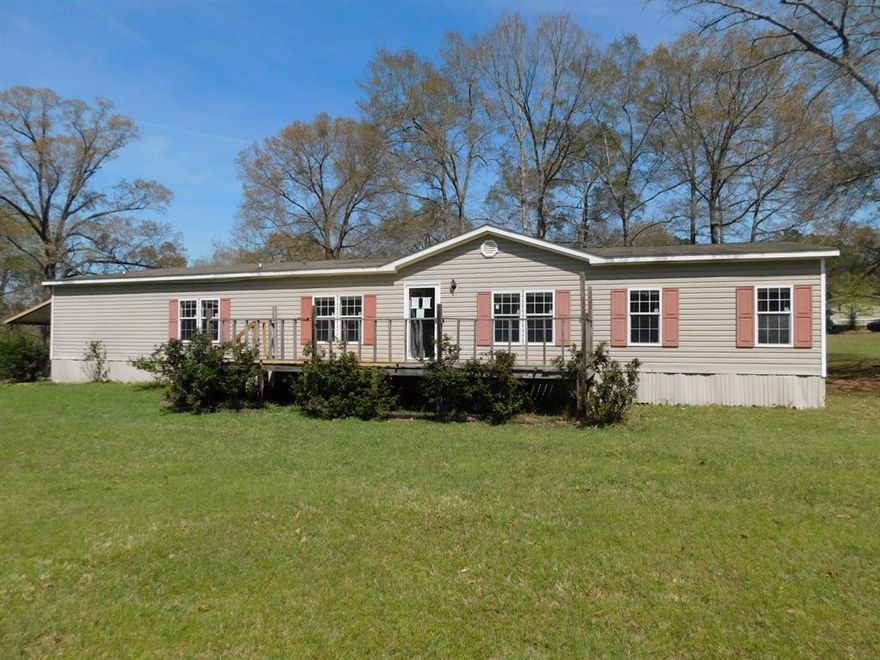 LARGE CORNER LOT 4 BEDROOM 3 BATHROOM HOME WITH 2,391 SQARE FEET ON A 0.55 ACRE LOT WITH TONS OF ROOM INSIDE AND OUT! HOME FEATRES A SPACIOUS KITCHEN AND OPEN FLOOR CONCEPT LIVING ROOM WITH WOOD BURNING FIREPLACE. REMOTE MAIN BEDROOM FEAURES A WALK IN CLOSET AND AN ADJOINING SITTING AREA.HOME ALSO FEATURES A NICE FRONT OPEN DECK AND SUPER NICE BACK COVERED PORCH AS WELL AS A DOUBLE METAL CARPORT. HUD OWNED HOME. CASE # 222-214950. PROPERTY SOLD AS IS. PURCHASER SHOULD OBTAIN EXPERT ASSISTANCE TO EVALUATE PROPERTY CONDITION. NO REPAIRS CAN BE MADE BEFORE CLOSING. SEE AGENT REMARKS.