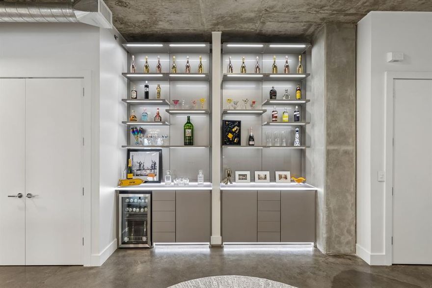 Rare double residence at 3030 Bryan Street offering an extraordinary 3,692 square feet of refined urban living on one level. This one-of-a-kind home features 2 bedroom suites, 3 full baths, 2 half baths, multiple living areas, dual utility closets, over 400 square feet of private storage, 4 secured parking spaces, and a dedicated EV charger — a truly unmatched amenity package for condominium living.

Soaring 11–13 foot ceilings, walls of floor-to-ceiling glass, and sleek concrete floors create a dramatic, light-filled interior. The open-concept design centers around a chef’s kitchen with quartz countertops, oversized island, gas cooktop, and upgraded appliances — ideal for both everyday living and entertaining.

Two spacious primary suites offer custom walk-in closets and spa-inspired marble baths with dual vanities, soaking tubs, and large showers. The third ensuite bedroom functions beautifully as a private study or guest retreat.

Nearly 700 square feet of private balcony space extends the living areas outdoors. Community amenities include a 55-foot resort-style pool with cabana, 2,000-square-foot sky deck, fitness center, secure pedestrian entry, and climate-controlled garage. A rare opportunity for sophisticated, lock-and-leave living in the heart of Dallas.