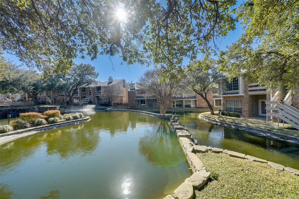 Photo of 3550 Country Square Drive #411, Carrollton, TX 75006 (MLS # 21170015)