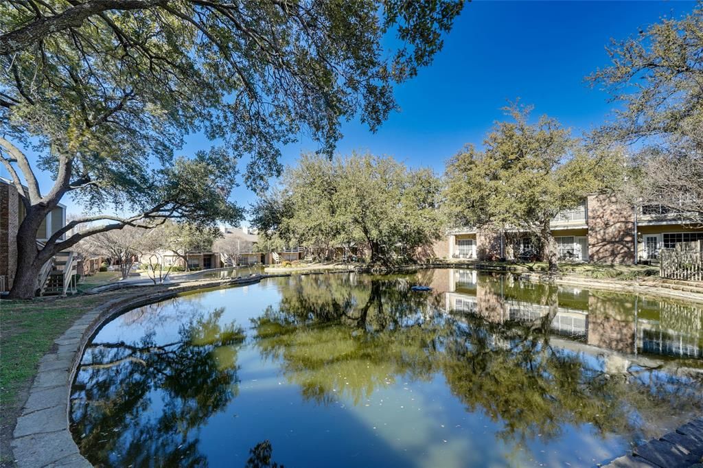 Photo of 3550 Country Square Drive #411, Carrollton, TX 75006 (MLS # 21170015)