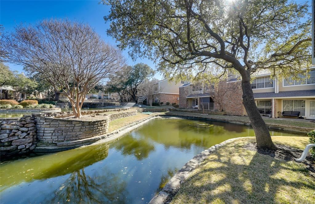 Photo of 3550 Country Square Drive #411, Carrollton, TX 75006 (MLS # 21170015)