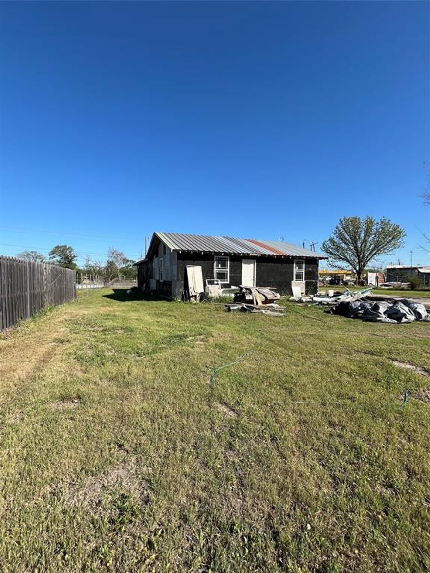 Perfect Investment property for someone looking for their next project. This home is currently incomplete construction but has lots of potential. It has 4 beds, 3 baths, living, dining and laundry area. It has all electricity as well as water. It is also placed in a commercial area so it can have multiple uses. Backyard will be cleaned up and owner will take everything unless the buyer would like to have it.