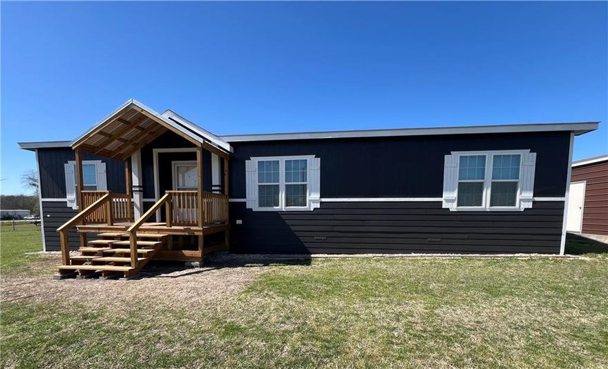 Welcome to your country get away. Fresh air and beautiful views. This amazing property makes you feel like you are so far away from the from the city but you are only a 15 minute drive from IH 35. This home is super spacious and boasts an open concept. Lovely kitchen with an island. Crown molding accent the living room. The master sweet is just divine. Huge bathroom with a large soak tub with his and her sinks on both the sides. The land and country views are so peaceful and stunning. This property also has a front porch, and an amazing large deck in the back. The metal two car garage is super spacious. Part of the land is fenced in for the doggies as well. This property is a must see.