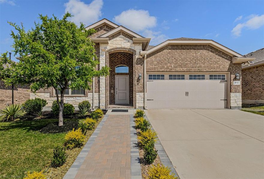 Discover your dream home nestled in the serene community of Glenn Heights, TX. This delightful residence offers 4 spacious bedrooms, 2 pristine baths, and a convenient 2-car garage. Designed for both comfort and style, this home is perfect for those seeking a harmonious blend of functionality and aesthetic appeal. Step inside to find an inviting open-concept living area highlighted by stunning wood-like tile floors. These elegant, durable floors effortlessly combine the warmth of wood with the easy maintenance of tile. The heart of the home, the kitchen, boasts modern fixtures, gas range and ample counter space, providing the perfect setting for culinary adventures or casual dining. The property features a beautifully appointed primary suite with huge walk-in closet, complete with an ensuite bathroom that exudes tranquility and relaxation. Three additional well-sized bedrooms share a second full bath, ensuring comfort and convenience for everyone in the home.

The exterior of the property is equally impressive, offering charming brick construction. Professional landscaping frames the home, offering a picturesque setting with a lush, manicured lawn. Enjoy outdoor living with an extended and covered patio, solar lights along the privacy fence that provides an ideal space for entertaining guests or simply unwinding after a long day. An extended sidewalk complements the outdoor space, adding functionality and beauty. TESLA back up battery provides peace of mind if there is a power loss. Two car garage has epoxy floor, shelving and retractable bicycle racks. Whether you're hosting gatherings or savoring quiet moments with loved ones, this Glenn Heights gem offers the ideal backdrop for life's treasured moments. Come experience the perfect blend of modern amenities and classic charm in a home that promises to be the sanctuary you have been searching for.