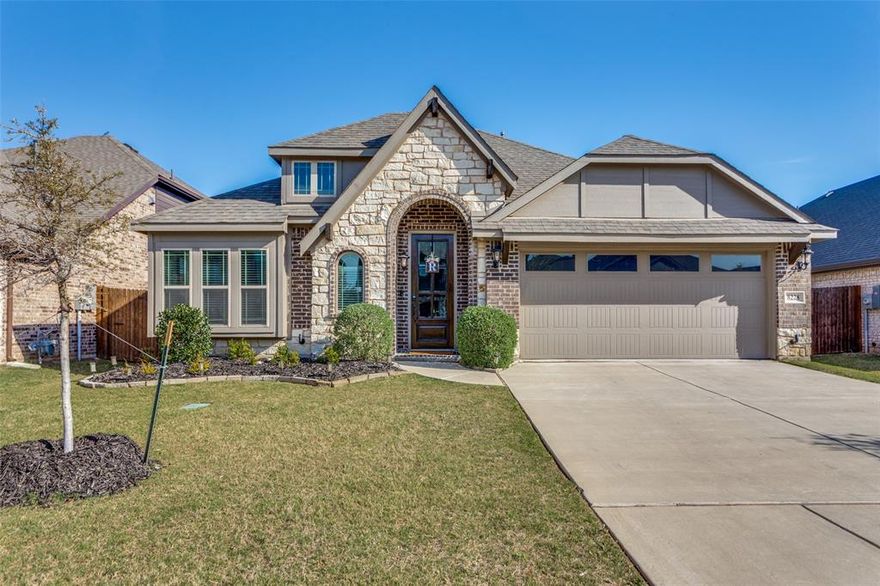 Beautiful 2023 Bloomfield Cypress II located in the desirable Godley Ranch community, offering just under 2,500 square feet of thoughtfully designed living space on a quiet interior lot. The flexible layout includes 4 bedrooms, 3 full bathrooms, a private study, and a spacious game room. The main floor features three bedrooms and two bathrooms along with a dedicated study ideal for a home office. Upstairs you'll find an additional bedroom, full bath, and large game room perfect for guests or entertainment. The upgraded chef’s kitchen includes a 48-inch professional gas range, stainless steel vent hood, designer lighting, and a built-in buffet in the dining area. The open living room is anchored by a gas wood-burning fireplace. Enjoy outdoor living on the covered back patio with natural gas outlet for grilling. Pool renderings are available to inspire a future backyard oasis. Conveniently located near Godley schools and Main Street with easy access to downtown Fort Worth and the Shops at Clearfork.