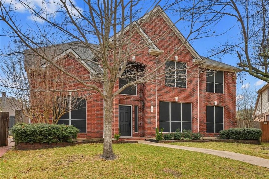 Welcome to The Lakes of Highland Oaks — a stately, established Keller neighborhood where this private cul-de-sac home offers the privacy and low-traffic setting families love. The rear alley driveway keeps the front elevation clean and inviting, while the backyard delivers a true resort-style escape: a stunning pool with water features, generous side yard space for outdoor toys and play, and a pergola-covered patio perfect for Texas-style BBQs and entertaining.

Step inside to a grand foyer staircase that immediately impresses. Open living and dining rooms at the front of the home offer incredible flexibility — use them as formal spaces, a dedicated home office, or bonus living area of your choice. The main living room just beyond is anchored by a cozy fireplace and flows seamlessly into the breakfast area and kitchen beneath dramatic two-story vaulted ceilings, with an abundance of windows flooding the space with natural light.

The kitchen is well-appointed for the home chef — featuring beautiful neutral granite countertops, and crisp light cabinetry with ample workspace throughout. A bonus room off the main hall with pre-wired surround sound serves perfectly as a private media room or dedicated office. A guest suite with its own closet and private full bathroom rounds out the main floor.

Upstairs, four spacious bedrooms and two full baths await. The split primary suite is a true retreat — complete with a romantic fireplace, and a private ensuite featuring double vanities, a walk-in shower, a separate soaking tub. Three secondary bedrooms share a full bath with double vanities and a private tub-shower combo.

Zoned to the highly sought Keller ISD within the coveted Keller High School feeder pattern, with easy access to local schools, churches, grocery shopping, and dining. Keller’s perfect blend of small-town feel and suburban convenience awaits — come experience it for your family!