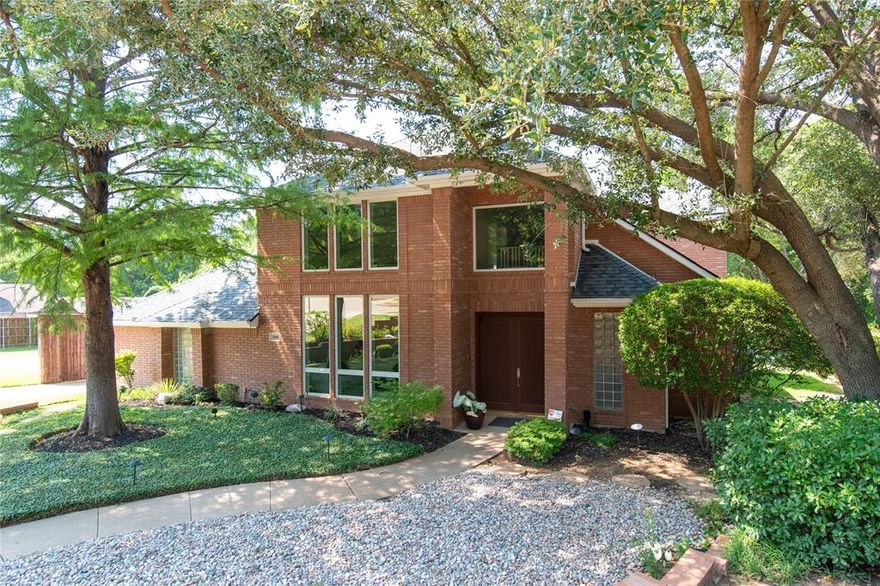 BACK AND BETTER! New gas cooktop installed—showings now active. Contemporary custom home on one of the largest lots in Western Oaks (0.848 AC) backing to greenbelt and creek. Spacious layout with 4 beds, 3.5 baths, multiple living areas and fresh updates. Grand double-door entry opens to 2-story foyer and light-filled living room. Entertain with ease in formal dining room with vaulted ceiling or inviting family room featuring built-ins cabinets, shelves and fireplace. The kitchen boasts granite countertops, island with sink, workstation, double ovens, microwave, and 4-burner gas cooktop(Nov. 2025). Utility room has pocket-door, cabinets, sink, and built-in ironing board. Freshly painted interior and carpet installed in July 2025, as well as, updated secondary bathrooms. First-floor private primary suite showcases a tray ceiling, recessed lighting, and wood-look tile flooring that continues into the remodeled ensuite bath and closet. Spa-like bathroom features skylight, heated floors, soaking tub, frameless river rock shower, ceiling fan, and dual vanities while the walk-in closet includes a built-in ironing board and chest of drawers. Upstairs, three spacious bedrooms, one with cedar closet, another with pocket-door, Jack-and-Jill bath, an additional full bath, and a large game room with a raised ceiling, wet bar with bar seating, wine fridge & rack, and built-ins—plus a walk-out balcony overlooking the greenbelt. The 4th bedroom includes built-in cabinets and shelves with a desk area, making it ideal for a private office or guest suite. Additional highlights include an intercom system, central vacuum, 3-car garage configured with a 2-car bay and a separate single-car bay, all windows have a lifetime transferable warranty, plus a composition, hail-resistant Class IV roof (installed July 2025). Backs to green space and creek. Upper yard approx. 49’ patio to retaining wall and 84’ wide—ideal for pool. Clear lower brush to expand entertainment area and view of creek.