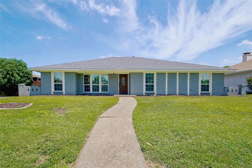 Welcome to 527 Goodwin Dr, a beautifully updated 5-bedroom, 3-bathroom home located in the highly sought-after Richland Park neighborhood of Richardson. This spacious, single-story residence offers the perfect blend of comfort, style, and functionality—with two separate living areas, a formal dining room, and a sparkling pool ready for summer fun. Step inside to find an inviting layout filled with natural light. The main living room features vaulted ceilings, picture windows, and a warm, welcoming atmosphere perfect for entertaining or relaxing. A second living area offers flexibility for a home office, game room, or additional lounge space. The formal dining room is ideal for hosting family dinners, while the breakfast nook is the perfect spot for casual morning meals. The updated kitchen is complete with granite countertops, decorative backsplash, stainless steel appliances, and plenty of cabinetry for storage. The primary suite offers a peaceful retreat with ample his and hers closet space and a private en-suite bathroom. Four additional bedrooms provide space for family, guests, or a home office setup. Step outside and enjoy your own backyard oasis. The beautifully maintained yard features a private pool, ideal for Texas summers, plus a covered patio perfect for grilling or relaxing with friends and family. The oversized lot offers plenty of room for play or pets. Located in the heart of Richardson, this home offers convenient access to major highways, parks, shopping, and dining. Zoned to desirable Richardson ISD schools, and nestled in a mature, tree-lined neighborhood, 527 Goodwin Dr delivers both location and lifestyle. Whether you’re looking for space to grow, entertain, or simply unwind—this home has it all. Schedule your showing today and experience the perfect balance of indoor comfort and outdoor charm.