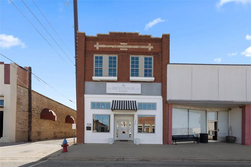 When history meets modern innovation…

Welcome to 508 Conrad Hilton St. in Cisco, TX! This fully renovated property seamlessly blends historic charm with contemporary upgrades, offering multiple income-producing opportunities.

This incredible space features a spacious storefront, currently home to Brynn House Boutique, a fully equipped studio apartment, and an unbelievably beautiful 2-bedroom, 2-bath home that will come fully furnished.

Upon entering the front of the building, you're welcomed by a beautiful open commercial space that is move-in ready. With its open-concept design, you have the flexibility to transform the area to perfectly suit your needs. Moving toward the back of the first floor, you'll find a charming studio apartment with private backdoor access, allowing for entry without passing through the storefront.

Upstairs, the entire floor is dedicated to a truly exquisite living space. As you reach the top of the stairs, you're immediately greeted by an abundance of warm natural light, illuminating the open-concept kitchen and living area—perfect for gathering.

The upper level boasts two bedrooms, including a massively oversized primary suite that beautifully showcases the character of the original building. Additionally, there is a loft space, offering extra sleeping space for up to four queen-sized beds, making this home ideal for hosting guests.

This incredibly well-thought-out and versatile property is perfect for both business and living. Don’t miss your chance to own this remarkable piece of history!