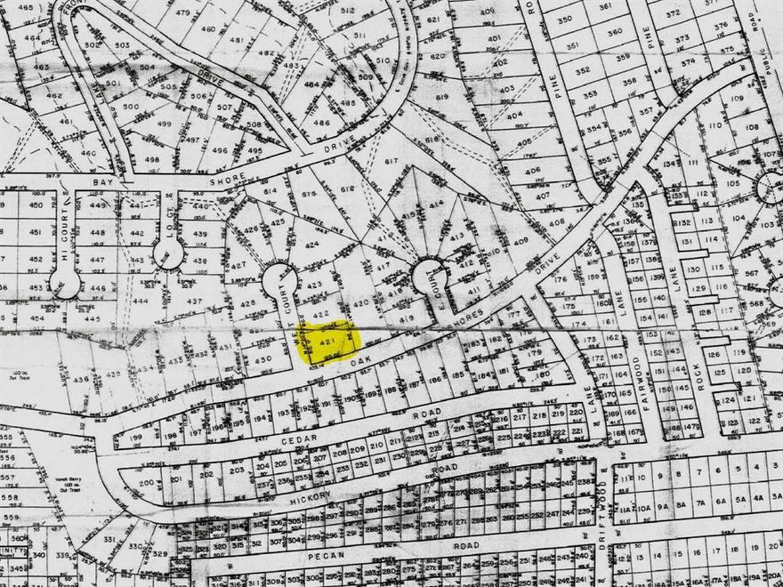 Lot is located on the main road in the improved subdivision of Oak Shores located on Lake Nocona. This lot is cleared and ready for your dream home close to the lake. It is situated less than .5 mile from the serene waters, offering all the pleasures of lakeside living without the lakefront price tag. Just down the road is Boone Park, a community park featuring a public boat ramp and pristine picnic areas. Invite your friends and family for a day or weekend of camping, fishing, swimming, boating, sunset watching, etc. on the beautiful shores of Lake Nocona. Lot 422 can be purchased separately to have a combined lot size of .43 acres. Oak Shores is going through a major revitalization, so don’t miss out before the prices of properties explode. Lots 420 and 422 can be purchased along with this lot for a combined lot size of almost an acre.