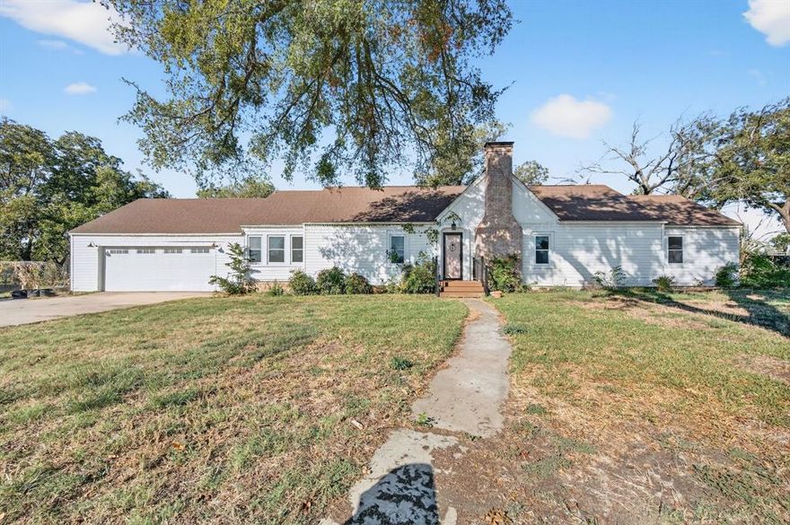 Welcome to this enchanting 3 bedroom, 2 bath home blending historic character with tasteful updates. Built in 1940, sits on just under one acre and offers a perfect balance of charm and functionality. This charming home offers approx. 1,972 sq ft with exposed beams, and cozy wood-burning fireplace.  Spacious living and dining areas flow into a bright kitchen with modern finishes and appliances. Primary suite features an ensuite bath. The oversized living with wood burning fireplace for entertaining or enjoying family time. Enjoy mature shade trees, fenced backyard, and circular driveway. Two-car garage plus detached workshop. A rare combination of vintage charm and modern comfort. Move-in ready and full of character!