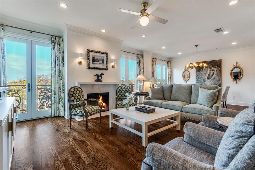 Exquisite, recently updated corner residence at the Park Highlander! Direct elevator access into a private foyer and entry hall with powder bath. Stone, hardwood flooring and designer wall coverings make this two bedroom, 2,255 sf a move-in ready pied de terre in a premier location! Spacious combined living and dining room with gas fireplace and Juliet balconies overlook the pool and water garden. Kitchen features built-in SubZero refrigerator & freezer, double convention Thermador ovens, six-burner Wolf gas cooktop and Asko dishwasher. Additional space off the kitchen provides space for a home office. Primary suite and bath has dual vanities, custom built-ins, walk-in closet,  separate shower and spa tub. Guest bedroom has an en-suite bath with built-in cabinetry and a balcony. The boutique Park Highlander luxury condominiums are located across the street from The Shops of Highland Park and within walking distance to numerous restaurants and The Katy Trail. Building amenities include on-site manager, 24-hr Concierge, updated lobby and fitness center as well as a pool and gardens. Residence 4D has two assigned in-garage parking spaces (#59 & #60).