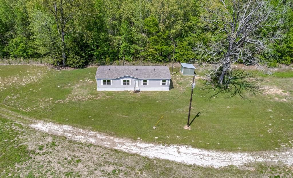 Photo of 980 County Road 2619, Marietta, TX 75566 (MLS # 21250645)