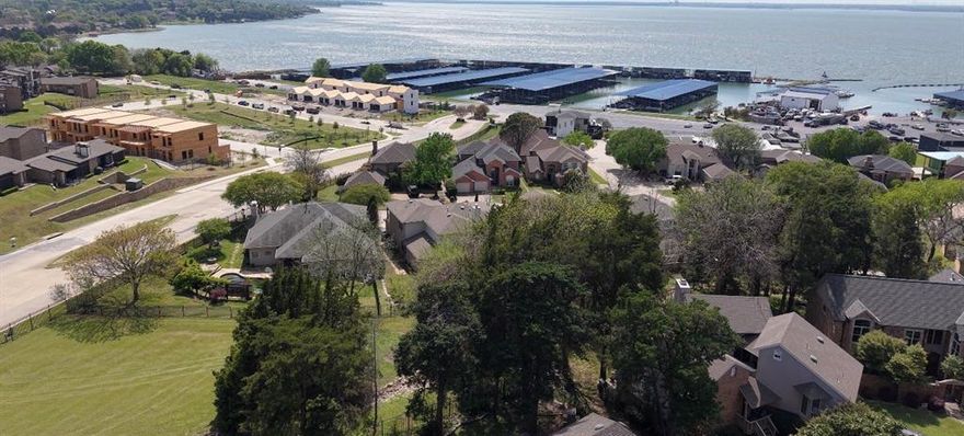 Discover one of the most coveted lots in the prestigious Chandlers Landing,perfectly positioned on a quiet cul de sac and backing to a serene pond, offering both privacy and picturesque views. Opportunities like this are few and far between, making this an exceptional chance to build your custom dream home in one of Rockwall’s most sought-after communities.Surrounded by mature trees and nestled within an established, beautifully maintained neighborhood, this homesite offers the ideal blend of tranquility and luxury living. Residents enjoy exclusive access to a 24-hour gated community featuring a private marina, scenic walking trails, tennis courts, a clubhouse, and an on-site restaurant creating a true resort-style lifestyle just minutes from the city.
Conveniently located with easy access to major highways and zoned to the highly acclaimed Rockwall ISD this property combines elegance, location, and lifestyle in one unmatched offering.
