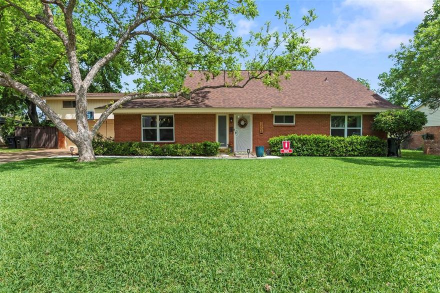 Located just 3 miles from TCU, this stunning fully remodeled 1959 mid-century home delivers a rare blend of classic character and modern sophistication, featuring brand-new windows throughout that enhance efficiency and fill the home with natural light. Every detail has been thoughtfully updated, including abundant built-in and custom storage, a beautifully redesigned kitchen with new appliances, quartz countertops, upgraded lighting, and new cabinetry throughout. Freshly installed LVP flooring and tile create a seamless flow, leading to an expanded primary suite with a spacious sitting area perfect for unwinding. All bathrooms have been fully remodeled with modern finishes and updated lighting. Newly exposed stairs with a custom railing dramatically open the living space, while the revamped pantry-laundry room includes a spiral staircase leading to a large den offering exceptional flexibility for entertaining or a private guest retreat. The refreshed sunroom showcases fresh paint and wood beams, and the outdoor living center features a newly installed fireplace, expansive yard, side storage, a dedicated astroturf area ideal for workouts or training, a well-preserved rear shop, and fencing replaced in 2024 with composite wood paneling backed by a 25-year warranty.