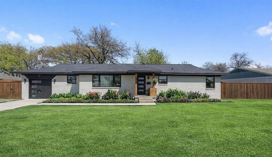 Stunning designer home in the desirable Casa View area of East Dallas featuring a bright open concept layout and thoughtfully curated modern updates throughout. This 3-bedroom, 2-bath home offers effortless flow for everyday living and entertaining. Warm wood flooring runs continuously throughout the entire home with no carpet, creating a clean, cohesive and low-maintenance space. Custom Roman shades add a tailored, high-end touch while enhancing privacy and natural light control. The stylish kitchen serves as the centerpiece of the home with quartz countertops, custom cabinetry, a dry bar, and a spacious pantry. The private primary suite provides a relaxing retreat with a walk-in closet and oversized shower. Step outside to a beautifully enhanced backyard designed for both relaxation and gathering. Enough space to enjoy evenings around a fire pit, a dedicated space to add a hot tub, or spend time in the garden space. One of the larger lots in Casa View. The large lot also features a new deck, fresh landscaping, and storage shed, offering flexibility for entertaining and outdoor living. Additional updates include new windows, plumbing, ductwork, and tankless water heater. Ideally located just minutes from White Rock Lake, the Dallas Arboretum, and popular dining and shopping, this move-in ready home delivers modern comfort, thoughtful upgrades, and an inviting East Dallas lifestyle.