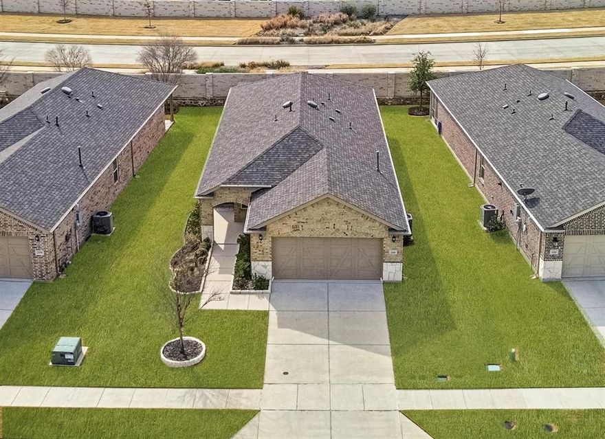 Welcome to the 55+ lifestyle you've been waiting for at Del Webb at Trinity Falls, McKinney's premier active adult community. This like-new single-story home offers effortless elegance with an open-concept floorplan, luxury vinyl plank flooring and a gourmet kitchen featuring soft-close cabinetry, granite counters, largte island, gas range and pantry—perfect for everyday living or entertaining. The spa-inspired primary suite boasts a dual-sink vanity and oversized walk-in shower, while a flexible third bedroom or den adapts beautifully as a home office or creative retreat. A bright sunroom overlooking the backyard offers a peaceful sanctuary for morning coffee or evening relaxation, and the backyard pergola, landscaped semi-private yard and brick fence create an ideal outdoor escape. The garage shines with epoxy flooring and built-in shelving—both included. Residents enjoy exclusive access to a 10,000 sq ft clubhouse, resort-style pools, fitness centers, 10 pickleball courts, 20 miles of trails and a vibrant social calendar. Minutes from the new H-E-B, Historic Downtown McKinney, top dining, shopping and major highways—this is refined, low-maintenance luxury living at its finest. Schedule your private tour today!