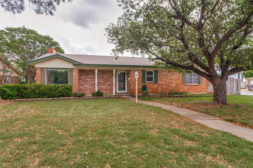 Fixer upper in the heart of Crowley offering great potential with solid bones and a versatile layout, features multiple living areas including a large enclosed sunroom, spacious backyard with an in-ground pool, and a detached structure workshop with covered parking, all situated on a corner lot with mature trees ready for updates and your personal touch.