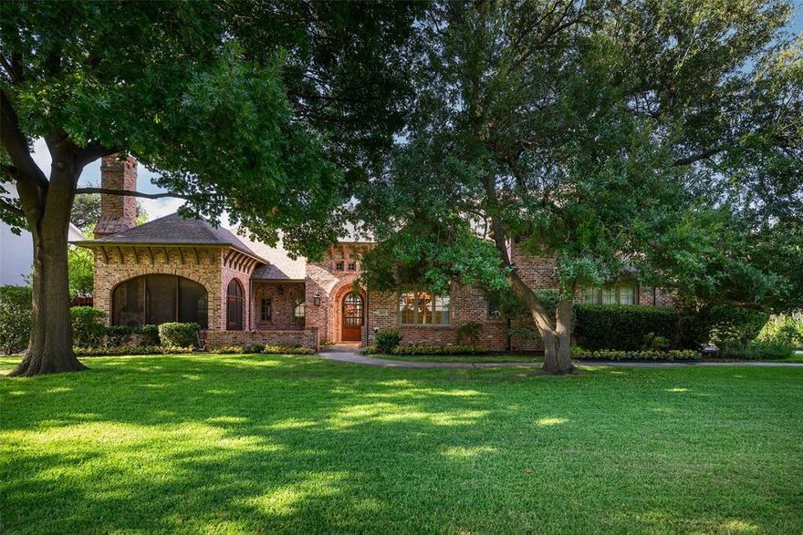 Welcome to this inviting 1.5-story north-facing residence by Registry Fine Homes, thoughtfully designed with the majority of living space on the first floor. A charming screened front porch with a cozy brick fireplace sets the tone for comfort and warmth before you even step inside. The gourmet, kosher-style kitchen is thoughtfully appointed with Viking appliances, two built-in refrigerators and dual dishwashers, offering flexibility for large-scale entertaining or separate meal prep. The kitchen opens seamlessly to the spacious family room with vaulted ceilings and fireplace and hearth - ideal for gatherings or everyday living. The primary suite is located downstairs and features a generously sized bath and walk-in closet. A true split-bedroom layout offers privacy, with a west wing perfect for an in-law suite. A dedicated study is smartly offset from the main living areas, offering added privacy for work or quiet time. Additional amenities include terrific storage, a private wine and liquor bar, and a versatile second-story layout featuring a game or media room, additional bedroom, and full bath-perfect for guests or flexible living needs. The large front yard is beautifully shaded by mature trees, while the backyard offers an outdoor patio with fireplace and built-in grill, along with open space and is pool-sized-ready for your custom outdoor vision. Oversized 2.5-car garage with large driveway that offers additional parking pads. Located on a quiet, non-cut-through street. Roof replaced in 2019. Ideally situated near the Cooper Aerobic Center and within close proximity to Dallas' premier private schools, shopping and dining, this home blends comfort, flexibility, and a sought-after location.