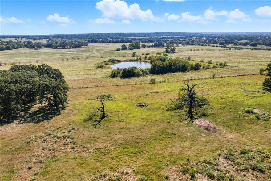 Nearly 32 acres of wide-open Texas beauty, just waiting for your big plans. NO DEED RESTRICTIONS here—so bring the barndominium, dream home, horses, cows, or all of the above.

The views? Let’s just say they don’t disappoint. Picture yourself sipping coffee overlooking the pond with the southern acreage spread out in front of you, or building just a bit higher on the hill where you can look out over the northern countryside. Either way, you’ll feel like you’ve got your own little slice of Texas heaven.

Best part? It’s Ag Exempt and outside city limits, so you get tax breaks, space, privacy, and endless possibilities, all without giving up the convenience of Whitesboro just minutes away.