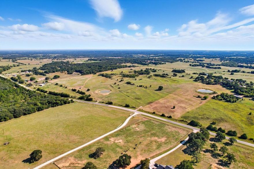 Nearly 32 acres of wide-open Texas beauty, just waiting for your big plans. NO DEED RESTRICTIONS here—so bring the barndominium, dream home, horses, cows, or all of the above.

The views? Let’s just say they don’t disappoint. Picture yourself sipping coffee overlooking the pond with the southern acreage spread out in front of you, or building just a bit higher on the hill where you can look out over the northern countryside. Either way, you’ll feel like you’ve got your own little slice of Texas heaven.

Best part? It’s Ag Exempt and outside city limits, so you get tax breaks, space, privacy, and endless possibilities, all without giving up the convenience of Whitesboro just minutes away.