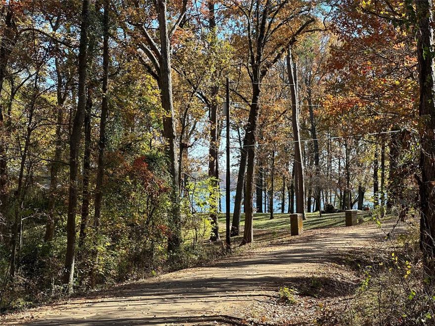 Are you ready to build your lake home in Hope’s Landing at Lake Bob Sandlin?! This welcoming, deed-restricted community is designed for easy, relaxed lake living and is ready to welcome you. Located on a quiet cul-de-sac, this wooded property offers a peaceful setting with mature trees that provide natural beauty and privacy, along with seasonal peek-a-boo views of the lake through the trees across the road. The lot(s) are ready for your custom vision—whether you’re planning a weekend escape or a full-time lake retreat. Homeowners enjoy access to a private community boat ramp, and trailer storage, making time on the water simple and convenient. With two additional boat launches just minutes away, boating and fishing are always within easy reach. If you'd like extra space, MLS #21148280 offers the opportunity to purchase the adjacent lot and create a spacious 1.15-acre homesite to bring your lake home plans to life. Hopes Landing community is perfectly situated mid-lake and conveniently located to Mt. Vernon, 
Mt. pleasant, and Pittsburg.