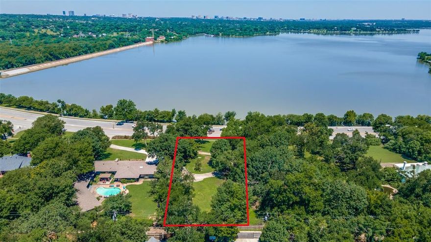 Incredibly rare opportunity for a one-acre lot overlooking beautiful White Rock Lake & the Pump House in the established Forest Hills neighborhood.
Seldom does a parcel of land of this size & pedigree come available with the sheer size allowing for multiple configurations of indoor & outdoor space. This parcel of land provides excellent ingress & egress with both street & alley access.  The location of this close in urban neighborhood is just minutes to White Rock Lake, the Dallas Arboretum, Lakewood Country Club, downtown Dallas and the Northlake, Casa View & Lakewood shopping center area restaurants & shops.  Build your dream home on this estate sized treed & elevated lot with a view of the Dallas skyline everyday when you pull out of your driveway!
Enter the lot just to the right of the For Sale sign & you can pull all the way up the driveway. There is a circle drive at the top of the lot for easy exiting onto Garland Rd.