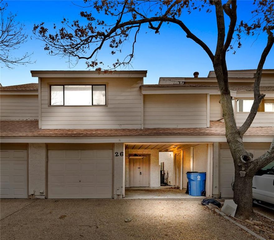 Experience the best of lake living at 26 Oakbrook in the sought-after Oakbrook on the Lake community, just a short walk to Lake Lewisville. Enjoy easy access to fishing, scenic morning and evening walks, and the community pool- perfect for a quick swim before or after a day at the lake.

Inside, the open floor plan is designed for comfort and entertaining. The dream kitchen features custom cabinets with pull-out storage, a wine cooler, and abundant workspace. Vaulted ceilings highlight the living room’s custom fireplace, creating a warm, inviting focal point. Two covered balconies provide moments to relax and reflect.

The updated primary suite offers dual vanities, a walk-in shower, and a spacious walk-in closet. Large secondary bedrooms include generous closets, and the third-level loft is ideal as a bedroom, office, media room, playroom, or mancave.

Parking and storage are plentiful with a garage, attached carport, additional common parking, and exterior storage closet.

Major updates include: roof (2019), both HVAC units (2020), primary bath (2023), secondary bath (2025), plus 2025 dishwasher, fireplace doors, garage opener motor, fireproof steel garage door, and tile flooring. Transferable home warranty included- move in now and be ready for spring and summer by the lake!