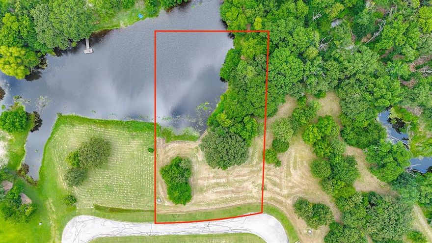 Beautiful 1 acre lot with pond in a gated community. Welcome to your slice of paradise! This stunning lot offers the perfect blend of natural beauty and modern amenities.  Nestled beside a peaceful pond and near direct access to Richland Chambers Lake, this level, partially wooded lot provides an ideal setting for your dream home or weekend retreat. Enjoy morning coffee with pond views, launch your boat for a day on the lake, or relax at the clubhouse pool after a workout in the clubhouse gym.  Don't miss this opportunity to own a beautiful, build-ready lot in a highly desirable lakefront community. No time limit to build, 1800 sq ft minimum heated and cooled. 
Note: Boat slips are currently being sold and are located about a block from this lot. Subject to availablilty.