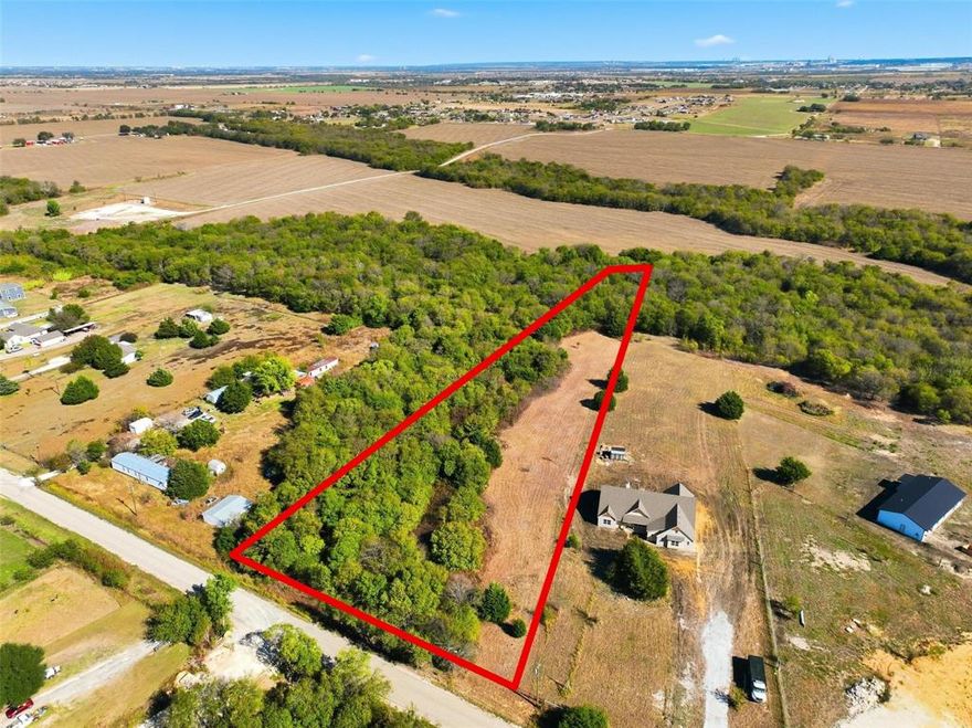 Discover the perfect blend of country living and convenience with this beautiful 2.99 acre property located in Alvarado, Texas. Nestled among mature trees and natural greenery, this uniquely shaped tract offers privacy, scenic views, and multiple potential building sites. With paved road frontage and surrounding homes on acreage, the setting feels peaceful and rural while still being within easy reach of big city amenities. 

Property includes an approximately 3,000 sq ft (60’ x 50’) suggested home site. The property features tree coverage and natural topography. A detailed mapping outlining flood zone boundaries and slope considerations from the right boundary line is available. Access points include Cozy Creek and Deer Hollow entrances.

The property features a mix of open pasture and wooded areas, ideal for building your custom home or creating a small homestead. Enjoy wide open Texas skies, abundant wildlife, and plenty of space for outdoor activities, gardening, or livestock.

Conveniently located with quick access to Alvarado, Burleson, and Fort Worth, this land provides the freedom of country living without sacrificing proximity to shopping, dining, and major highways. Whether you are looking to build now or invest for the future, this 2.99 acre tract is a rare opportunity in a growing area of Johnson County.

Come walk the land and imagine the possibilities this peaceful Texas property has to offer. Property includes clearly marked boundary references, mapped flood zone information for planning purposes, and designated entry points. This tract is well-suited for buyers looking to build in a growing area while maintaining space and a country setting. Please feel free to reach out for pricing, surveys, additional mapping, a walk-through video, or to schedule a site visit.