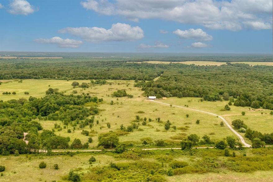 Welcome to your private slice of Texas—50 ag-exempt acres of peaceful, unrestricted countryside offering unlimited potential. Whether you're dreaming of building a custom estate, launching a working ranch, or securing a weekend escape, this property delivers a rare blend of privacy, usability, and natural beauty.

The land features a mix of open pasture—perfect for grazing horses or cattle—and scenic wooded areas, complete with winding natural water passageways, pecan trees, abundant wildlife, native foliage, and panoramic views make it a true outdoor lover’s paradise.

Tucked away from the hustle and bustle, the property offers peace and quiet, yet remains conveniently located just minutes from Lake Texoma, where you can enjoy world-class fishing, boating, hiking, and recreation. Shopping, dining, and entertainment await in nearby Gainesville, Sherman, and Whitesboro, and for nightlife or weekend fun, the Oklahoma casinos are a short drive north. Even the DFW Metroplex is easily accessible for commuters or second-home seekers.

Shown by appointment only. Come experience the possibilities this one-of-a-kind ranch property has to offer.