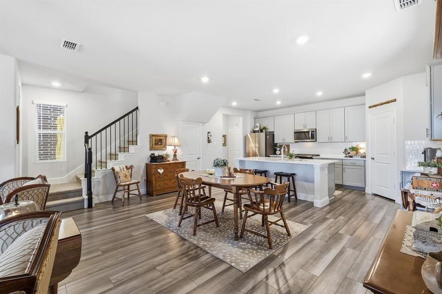 This 2023 built 3-2.5-2 still looks like new and is even better because it comes with a refrigerator, washer, dryer & window blinds! Located in the coveted Ashford Park community of Corinth, TX.  Sweeping open and bright plan with all the amenities today's buyer is looking for! The inviting front elevation features a covered patio with a beautiful view of sunsets. On the main floor are a guest powder room and a coat closet near the entryway. The kitchen offers white cabinets with white pearl quartz countertops and a gas range! Spend summer weekends on the lake when you live just minutes from Lake Lewisville. Upstairs, a versatile game room or flex space offers endless possibilities—ideal for a home office, media room, or second living area. The private primary suite is split away from the others for privacy and includes a well appointed ensuite bathroom, a huge walk-in closet, and a peaceful retreat. The upstairs utility room is conveniently located near all bedrooms for easy access. Two additional bedrooms are situated near a large secondary bathroom, providing comfort and functionality for family or guests. Enjoy comfortable living with a smart layout, abundant natural light, and a warm, welcoming atmosphere throughout. Community amenities include a swimming pool, community trails and playground, all within a peaceful, family-friendly environment. With quick access to major freeways, commuting and travel are a breeze. With over 2200 sqft and being very energy efficient, this is a very good buy for the price.