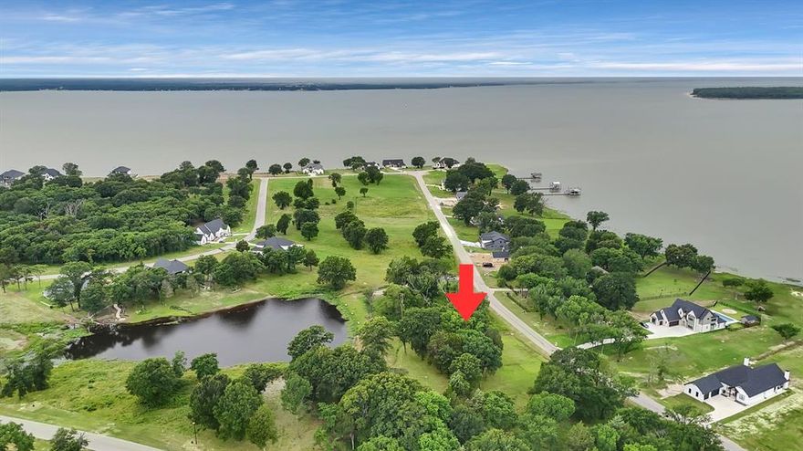 MOTIVATED SELLERS!! Experience the luxurious lake living this community offers! This property features water views from the front and the back of the lot. Located in a gated community off of Cedar Creek Lake. This community offers plenty of amenities including a pool, gym, and club house space. This lot has private access to the community pond where catch & release fishing as well as kayaking is allowed. This lot is located next to a community space; therefore, the lot will only have 1 neighbor, located on the right-hand side of the lot. Easy access to the community boating dock. Located near Cedar Creek Country Club and golf course. This lot offers a great opportunity to make this space a forever or vacation home!