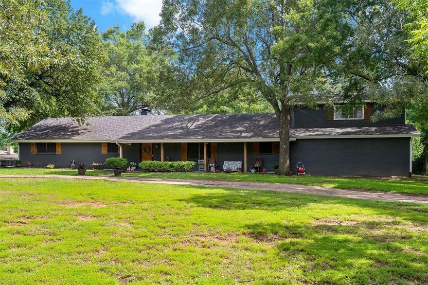 Nestled on a peaceful .69-acre lot in the highly sought-after Reno area, this quiet and inviting 3-bedroom, 2-bath home offers space, comfort, and timeless style. Located within the North Lamar School District, the property is shaded by mature trees and features a circle drive for easy access and curb appeal.

Step inside to an open floor plan that includes a spacious living room and a warm, inviting dining room with a fireplace, perfect for gathering with friends. The kitchen is a chef’s delight with customs cabinets, an island with sink, all with beautiful countertops. A pantry, butler’s pantry leads to a utility room, all flowing into a cozy breakfast area.

The primary suite is thoughtfully designed with a private, suite-style layout, offering a serene retreat. Upstairs, you’ll find a large game room, ideal for entertainment, hobbies, or an additional living space.

Enjoy outdoor living on the expansive back patio, surrounded by nature and privacy. With its ideal layout, desirable location, and charming features, this home is a rare find in the Reno area.