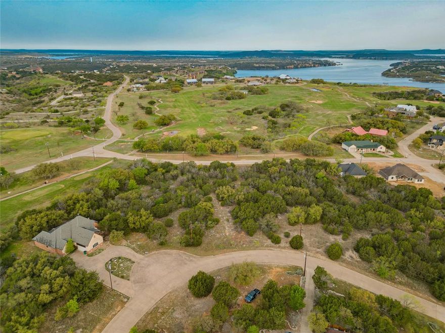 Discover the perfect opportunity to build your dream home on Lot 11 Shoal Creek in The Cliffs Resort at Possum Kingdom Lake! This spacious quarter-acre+ lot is located within one of Texas’ premier lakefront communities, offering breathtaking natural beauty and access to world-class amenities. Residents of The Cliffs enjoy an 18-hole championship golf course with stunning lake views, two resort-style swimming pools, a full-service fitness center and spa, and an on-site bar & grille for dining and entertainment. The community also features a private marina with boat ramp and slips, tennis and pickleball courts, scenic hiking trails, and gated security for peace of mind. Whether you're looking for a weekend retreat or a full-time residence, this lot provides an exceptional location to enjoy the best of Possum Kingdom Lake. Ownership includes access to all resort amenities and 36 rounds of golf per year. Don’t miss this incredible opportunity.