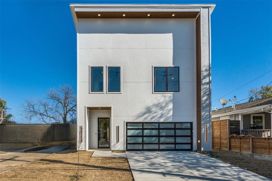 Now Listed   Modern Luxury in West Dallas
Experience elevated living in this stunning 4-bedroom, 3.5-bath new construction, crafted with sleek architecture and high-end designer finishes. The open-concept layout features a showpiece kitchen with a waterfall island, custom cabinetry, and premium appliances, flowing seamlessly into a sophisticated living area highlighted by a dramatic stone accent wall and modern fireplace.
The spa-inspired primary suite offers an oversized walk-in shower, dual vanities, and a spacious custom closet. Additional bedrooms provide flexibility for guests or work-from-home needs. A stylish glass-panel garage and clean contemporary lines complete this impressive home.
Perfectly positioned minutes from Trinity Groves and Downtown, this luxury residence blends modern design with exceptional convenience.
As an added advantage, the builder is extending exclusive closing concessions with a full-price offer—an exceptional opportunity to elevate your purchase with premium value.