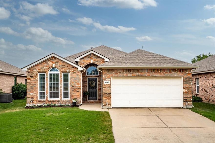 Welcome home! Ideally located in Fort Worth and conveniently near Crowley High School and Dallas Park Elementary, this charming, low-maintenance home is ready for its next owner. Step inside to a light and airy atmosphere that instantly feels refreshing and inviting. The spacious living room is anchored by a cozy fireplace, creating the perfect setting for relaxing evenings or gathering with loved ones. The kitchen is both stylish and functional, featuring sleek white cabinetry, stainless-steel appliances, and ample built-in storage to keep everything organized and within reach. The primary suite offers a peaceful retreat, complete with an ensuite bathroom designed for relaxation, including dual sinks, a garden tub, and a separate walk-in shower, perfect for unwinding at the end of the day. Two additional bedrooms and a full bathroom provide flexibility for loved ones, guests, or a home office. Fresh carpet has been installed in all three bedrooms, adding a clean and updated touch throughout. Step outside to enjoy a covered patio area, ideal for outdoor dining or quiet mornings, along with privacy fencing and a spacious backyard ready for your personal touch or future upgrades. This home blends comfort, convenience, and charm, don’t miss the opportunity to make it yours!