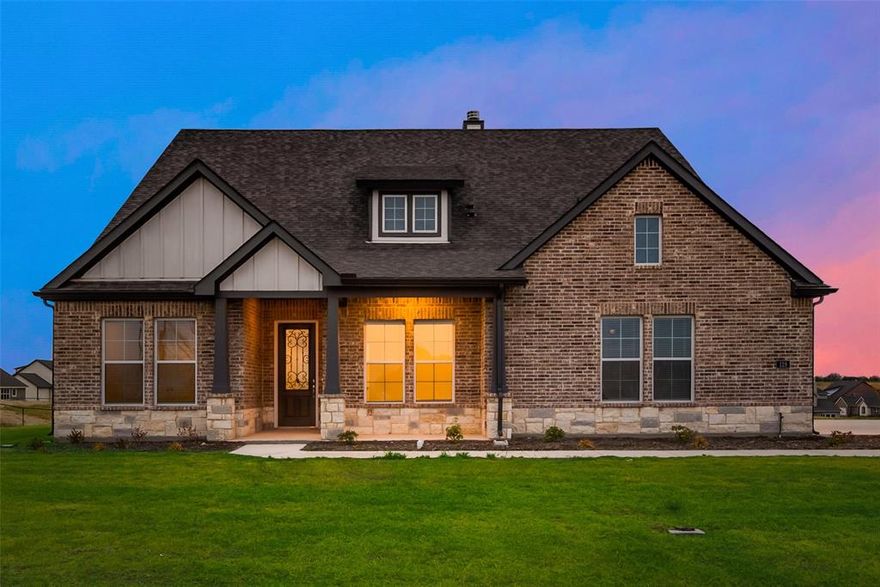 Energy Star Certified home with spray foam insulation! An open concept kitchen with 3 CM Blanco River Granite counters, and 42 inch raised panel style tombstone painted cabinets! This home comes with wood look tile flooring in all main living areas downstairs, upgraded carpeting with plush half inch, 5lb padding, mudroom with barn door and utility sink and much more!