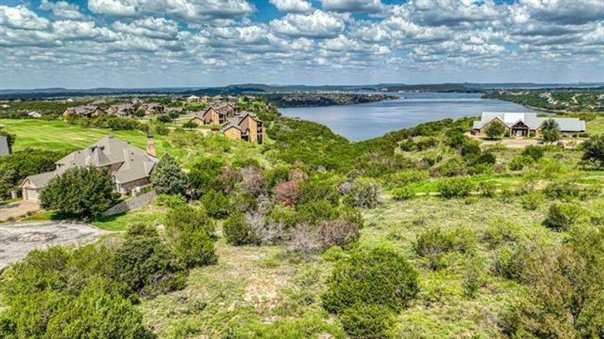 WATER VIEW GOLF COURSE LOT IN THE CLIFFS RESORT ON POSSUM KINGDOM LAKE. Build your dream home on this stunning water view lot situated right off the tee box of hole #10. The Cliffs Resort is a highly sought after location at Possum Kingdom lake! This beautiful property offers the perfect blend of lake views, rolling golf course scenery, and peaceful resort living. Enjoy all the amenities this premier community has to offer. Amenities include 36 complimentary rounds of golf per year on the championship course, two swimming pools, marina access, restaurant, hotel, tennis courts, and 24 hour security. This location is ideal for a relaxing getaway or full time living. Whether you're looking to build now or invest for the future, this lot offers both beauty and value on Texas's best lake. 
Don't miss your chance to own a piece of paradise at The Cliffs Resort on Possum Kingdom lake!

All information in listing deemed reliable but not guaranteed.  It is up to the buyer and buyer's agent to verify.
