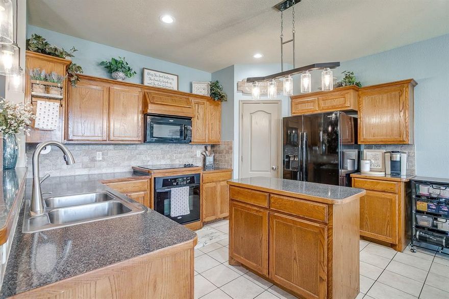 Welcome to your new home! Located in desirable Shannon Creek Estates with NO HOA! Close to dining, shopping and entertainment as well as access to HWY 35 or Chisolm Trail for commuting with ease. Step inside this amazing home showcasing Astons’ finest. Inviting you into this flowing floor plan, you are greeted with a fresh, bright and upgraded color pallet, new carpet and crisp decorative lighting. This open concept layout offers you entertaining potential complete with ample, rich, solid wood cabinets for storage, tons of counter top workspace and bonus window seat options for guests. The living and kitchen conjunction assures you do not miss out on enjoying family and friend time. Split bedrooms allow the adults their relaxation zone and the spacious secondary rooms offer the rest of the family privacy and comfort. Walk in closets, linen closets, and an overflow extra pantry are just a few of the optimal storage qualities offered. The 4th bedroom has the flexibility for an office space, flex space, workout room or more! Escape out back and enjoy the breathtaking Texas skies while starting your morning or ending your day-this tranquil place allows you to soak it all in, all year round. Complete with massive covered back patio, cafe lighting, shaded extended pergola- perfect for hosting any gathering or event. Plenty of room left for your creative touches or adding a pool. Some added upgrades are hot water heater replaced in 23 with option for lifetime warranty, roof replaced in 23, solar screens for added energy efficiency and HVAC has had internal parts updated in 26. The garage features an oversized bonus storage space toward the back. A remarkable move in ready home just waiting for the next family to make many memories. Well established neighborhood, landscaping and community. Schedule to see TODAY!
