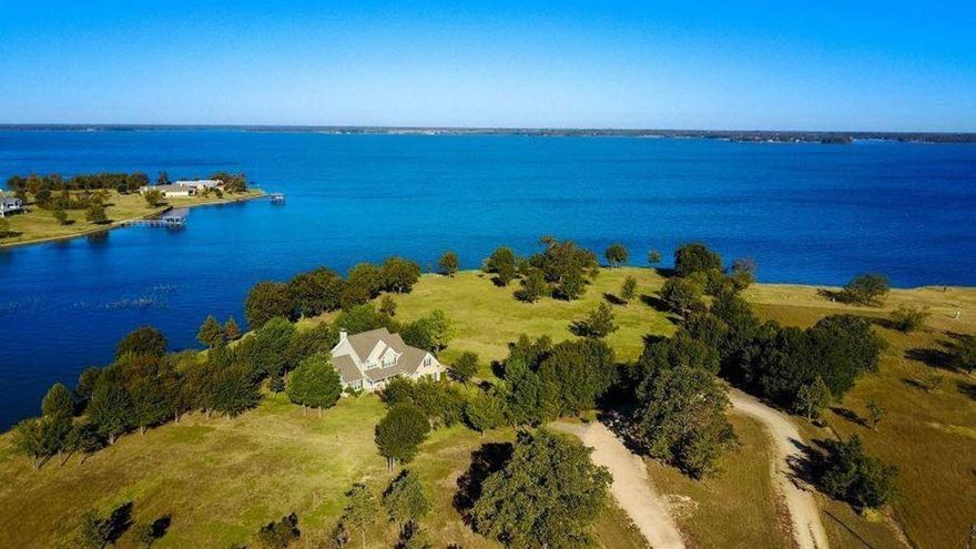 RARE LAKE FRONT ESTATE on 138 acres situated on approximately 1500 feet of Richland-Chambers Lake frontage. Whether you are into boating, fishing, hunting, horses, cattle, or just enjoying lake life this recreational paradise has it all.   Breathtaking panoramic water views from this custom-built home with Texas-sized rooms.  Features: Lg open family room, formal dining, stone fireplace, gourmet kitchen, Lg covered porch.  Approximately 1200 ft of steel retaining wall with a dock and boat ramp. 
Lots of Possibilities here! FANTASTIC PRIME AREA for DEVELOPING a lakeside community! The serenity of this lake estate is captivating with endless potential! Underground utilities have been run to 7 additional lake-front lots for possible future development.  Currently Ag Exempt (excluding 1-acre for home)*